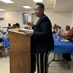 woman speaking at podium